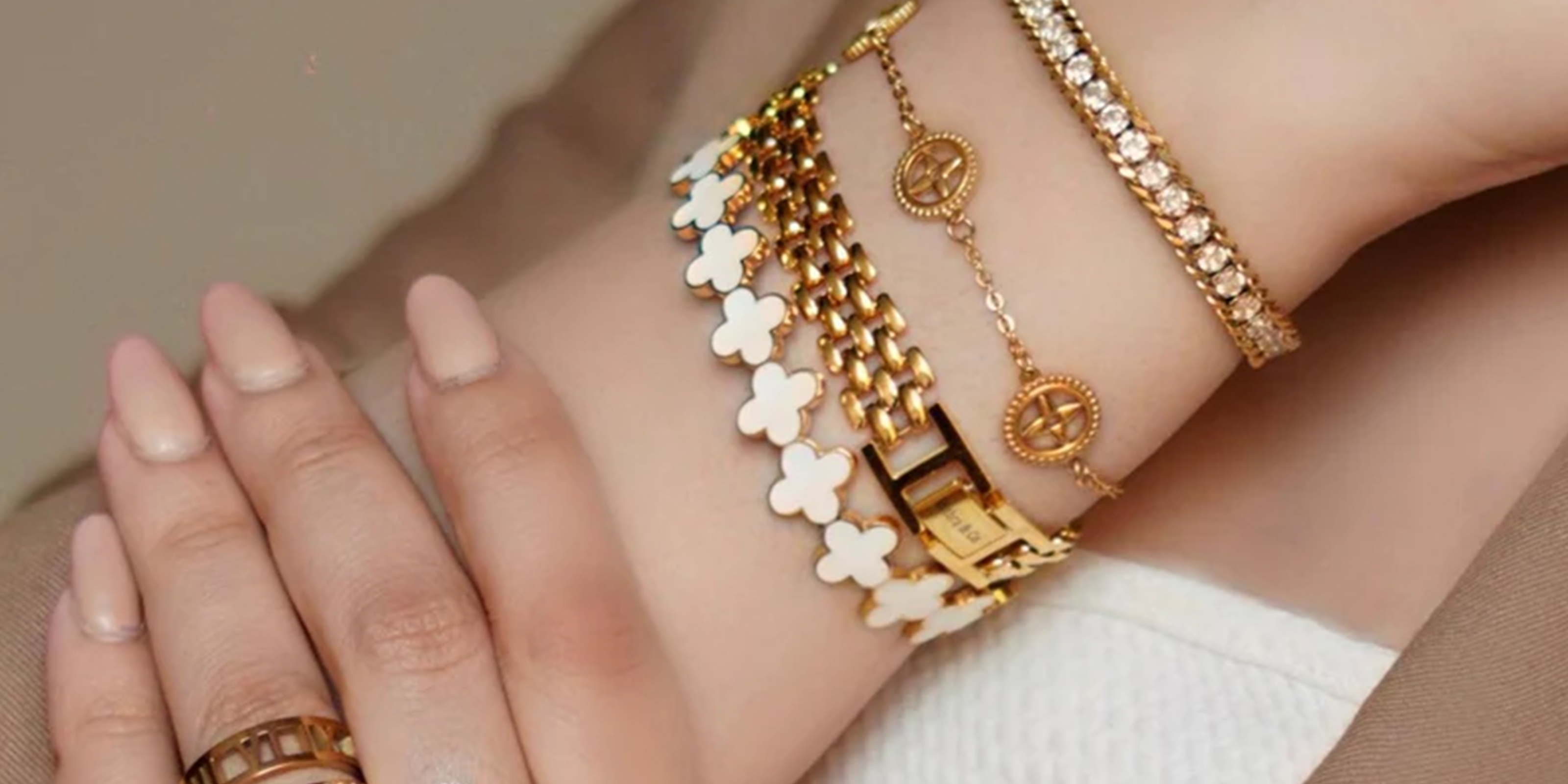 Hand wearing 9-5 office vibes jewelry for working women in Pakistan.