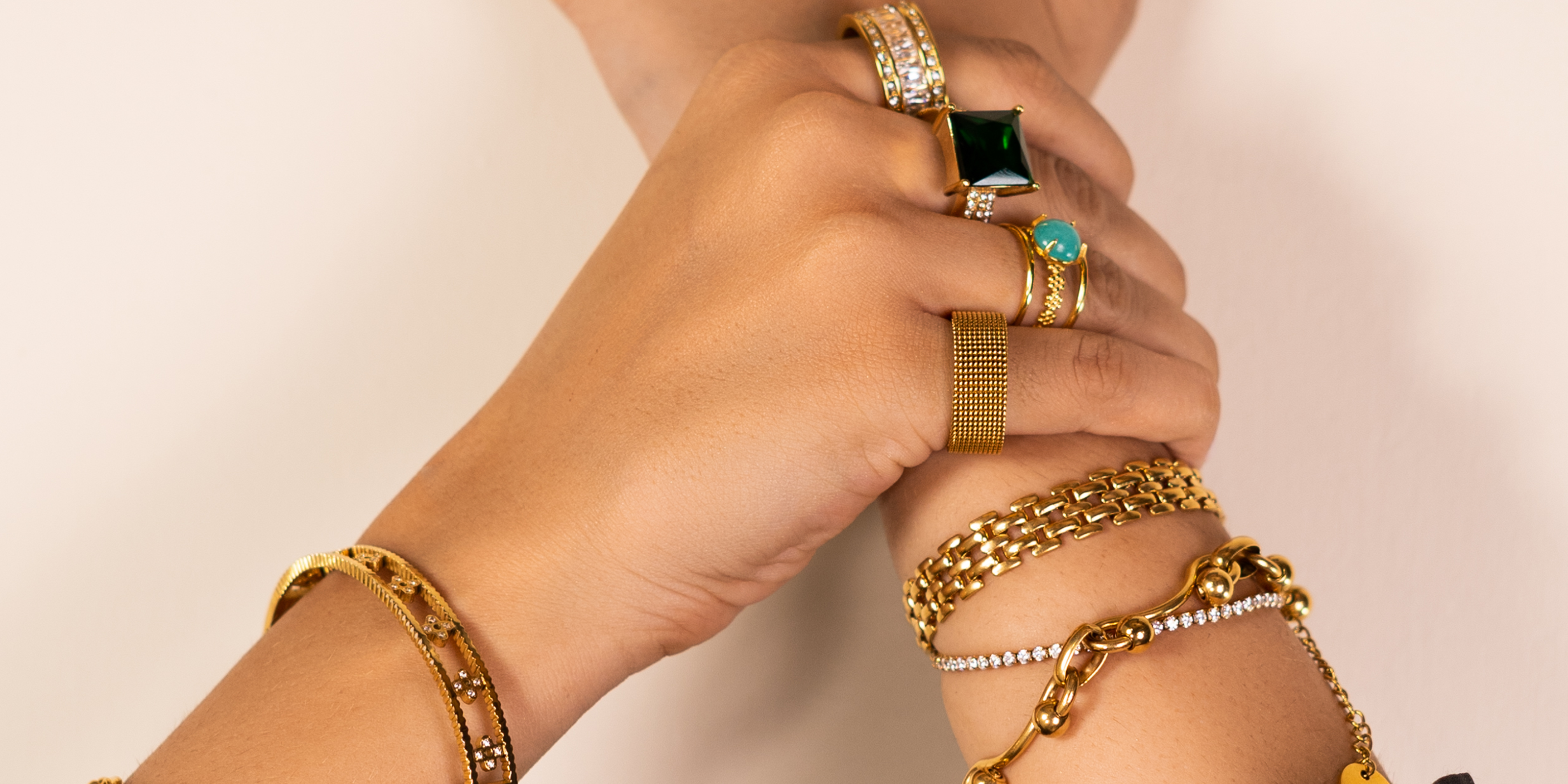 Girl hands layering in Luxury 9-5 Vibes Colleciton. 18k gold plated Jewelry for Office wear. Buy Online Pakistan.