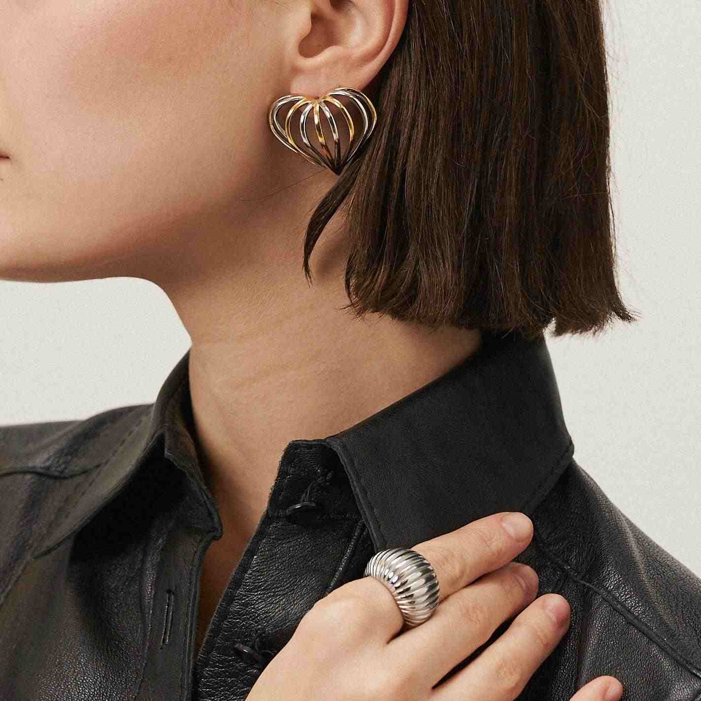 Girl wearing silver plated ring. Buy Online.