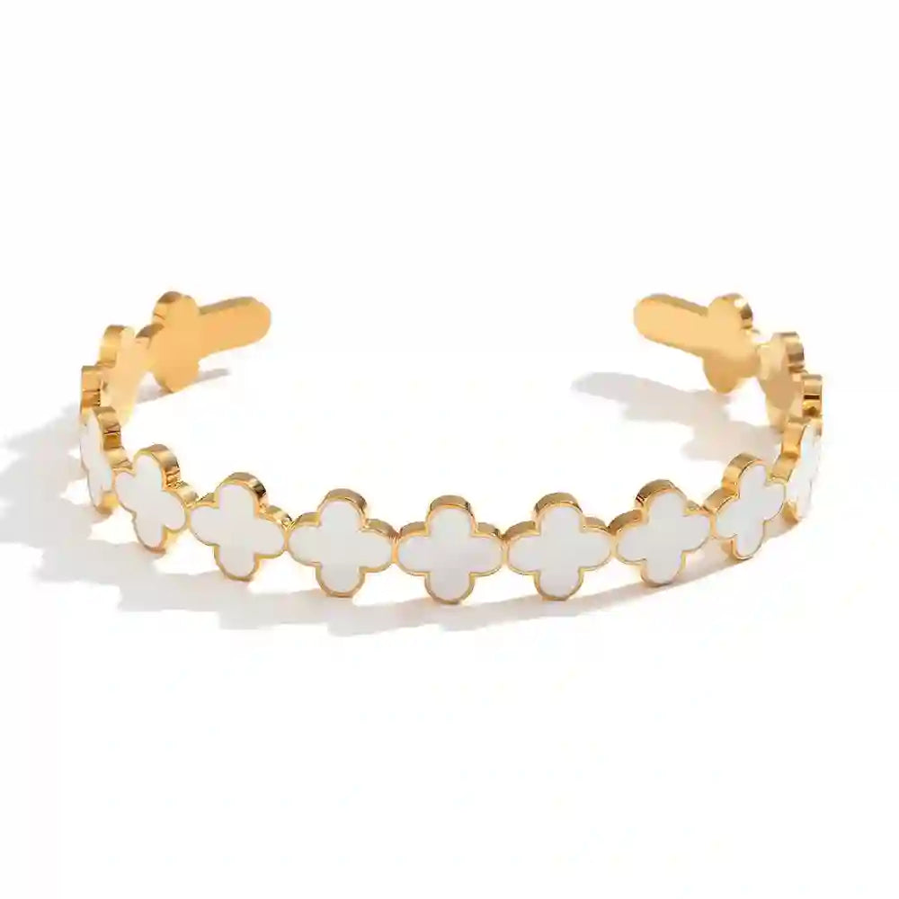Ebony White. Shop Clover bangle - Open Cuff Bracelet Gold.