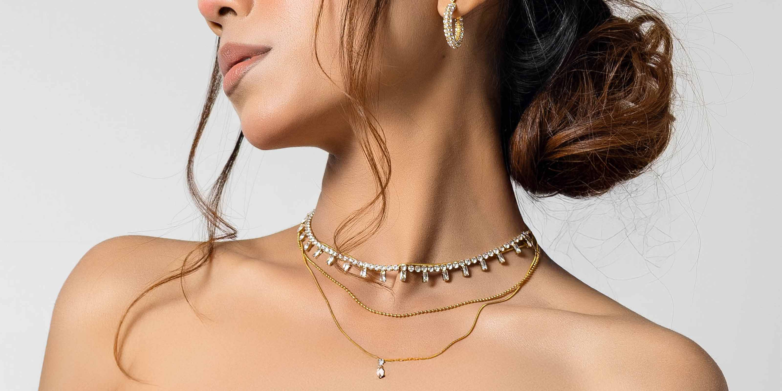 girl wearing everyday Necklace chain 18k gp jewelry lifestyle shot. SHop 18k Jewelry Online at Mithra Official Pk.