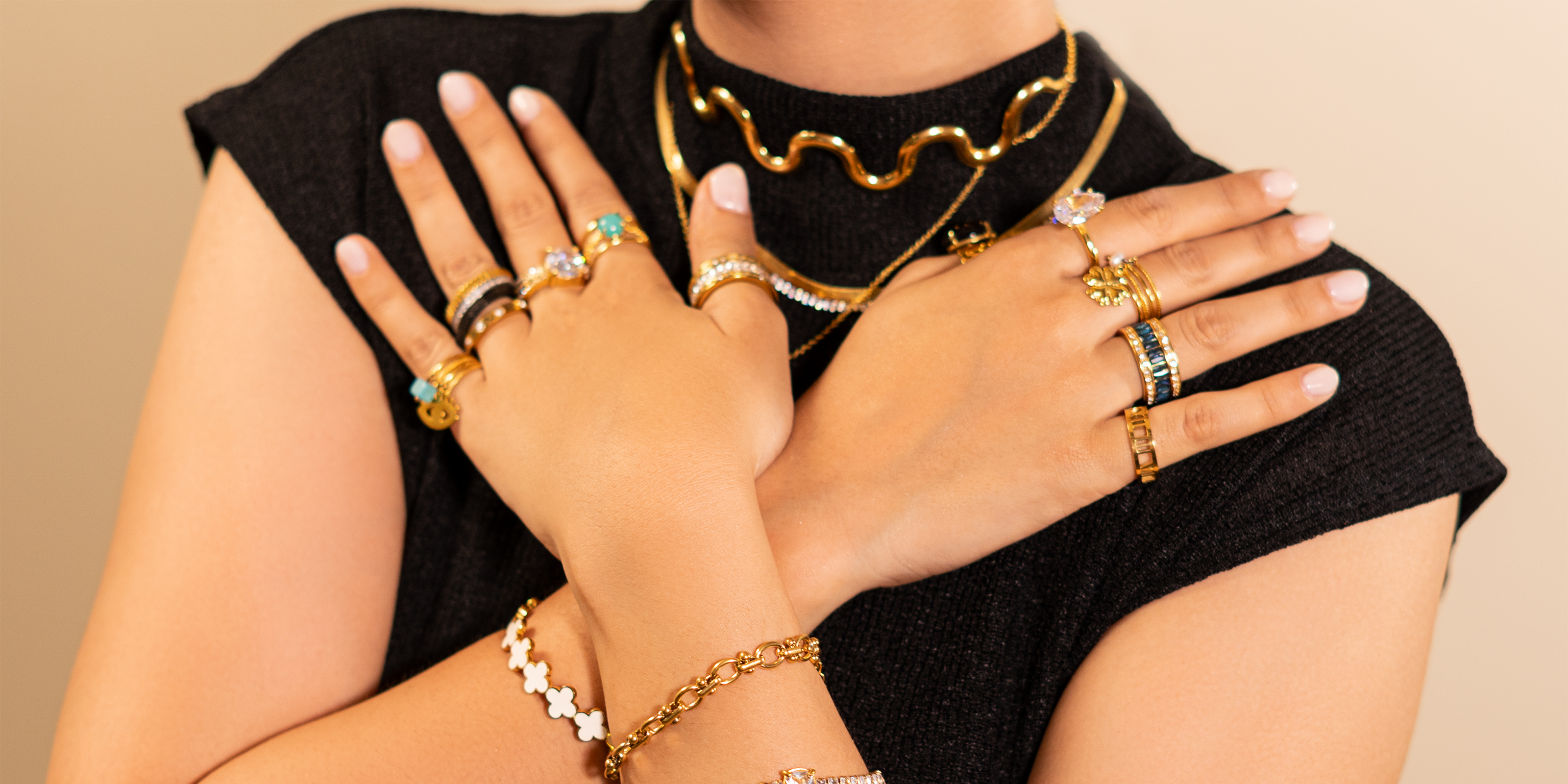 Woman wearing 18k gold plated vintage jewelry collection, rings, bracelets, and necklaces, shop online Pakistan, vintage jewelry for women.