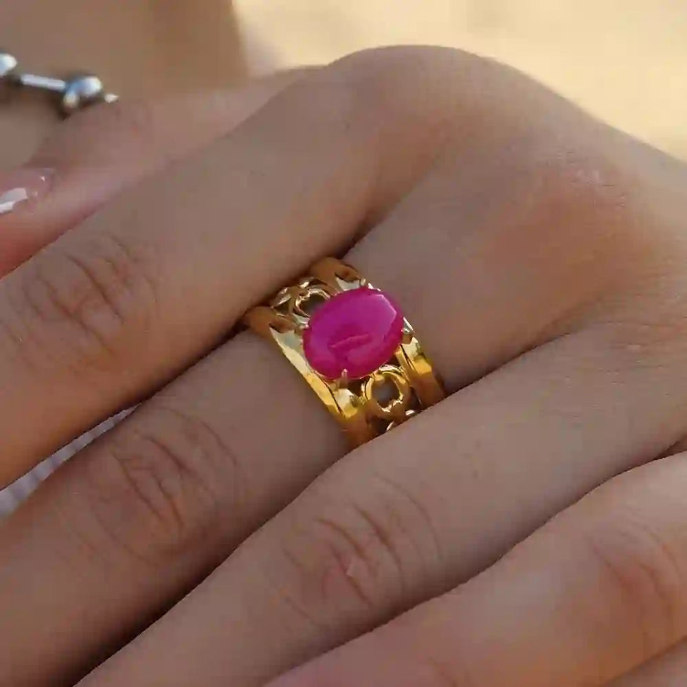 Closeup of a Girl Wearing Gold Plated Filigree Lattice band design Berry blush ring with Pink Opal. Buy Online at Mithra and Co.