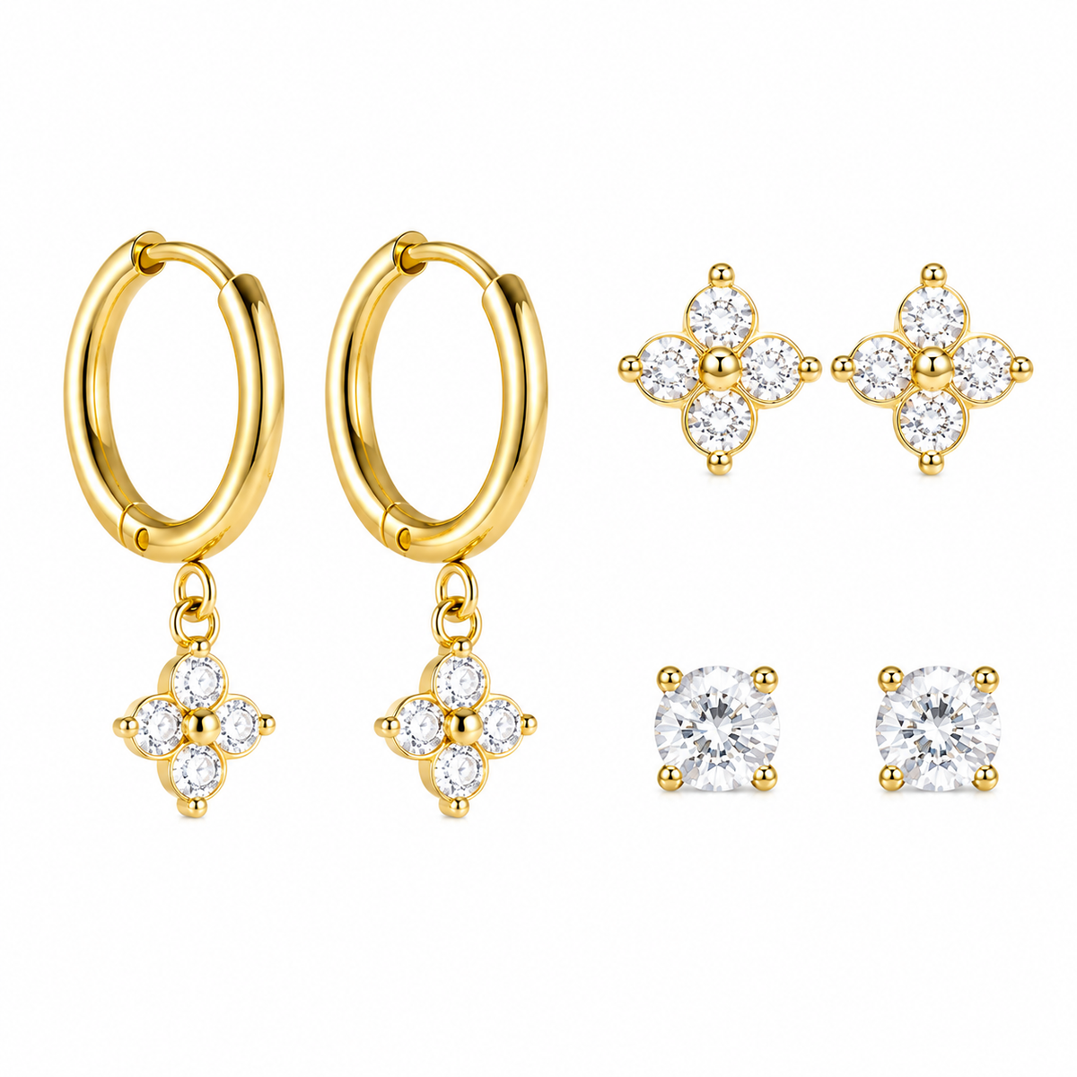 A Clover Hoop n stud Earrings set featuring dangling pair of hoops and studs with floral clusters of clear stones, with stud earrings four leaf design clear stones each, displayed on a white bg.