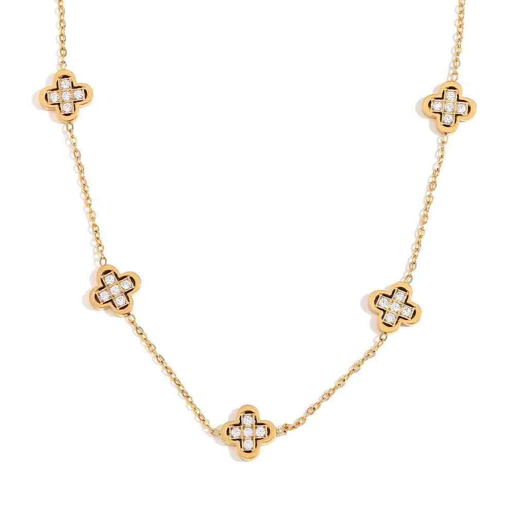 Studio shot of Gilded Clover Necklace - Multi-Motif Zircon-Inlaid Clover design Neck chain. Shop at Mithra and Co.