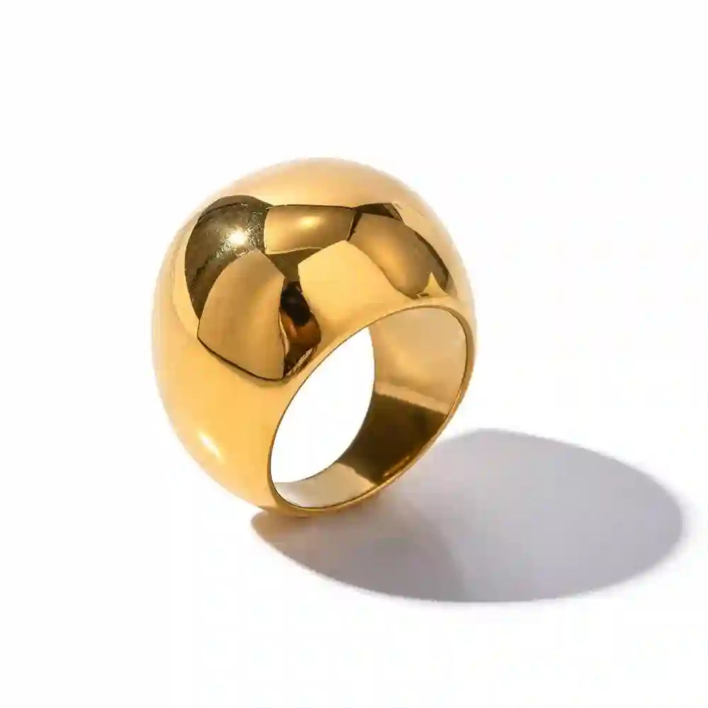 Studio shot of Orb ring with spherical dome design on a white background