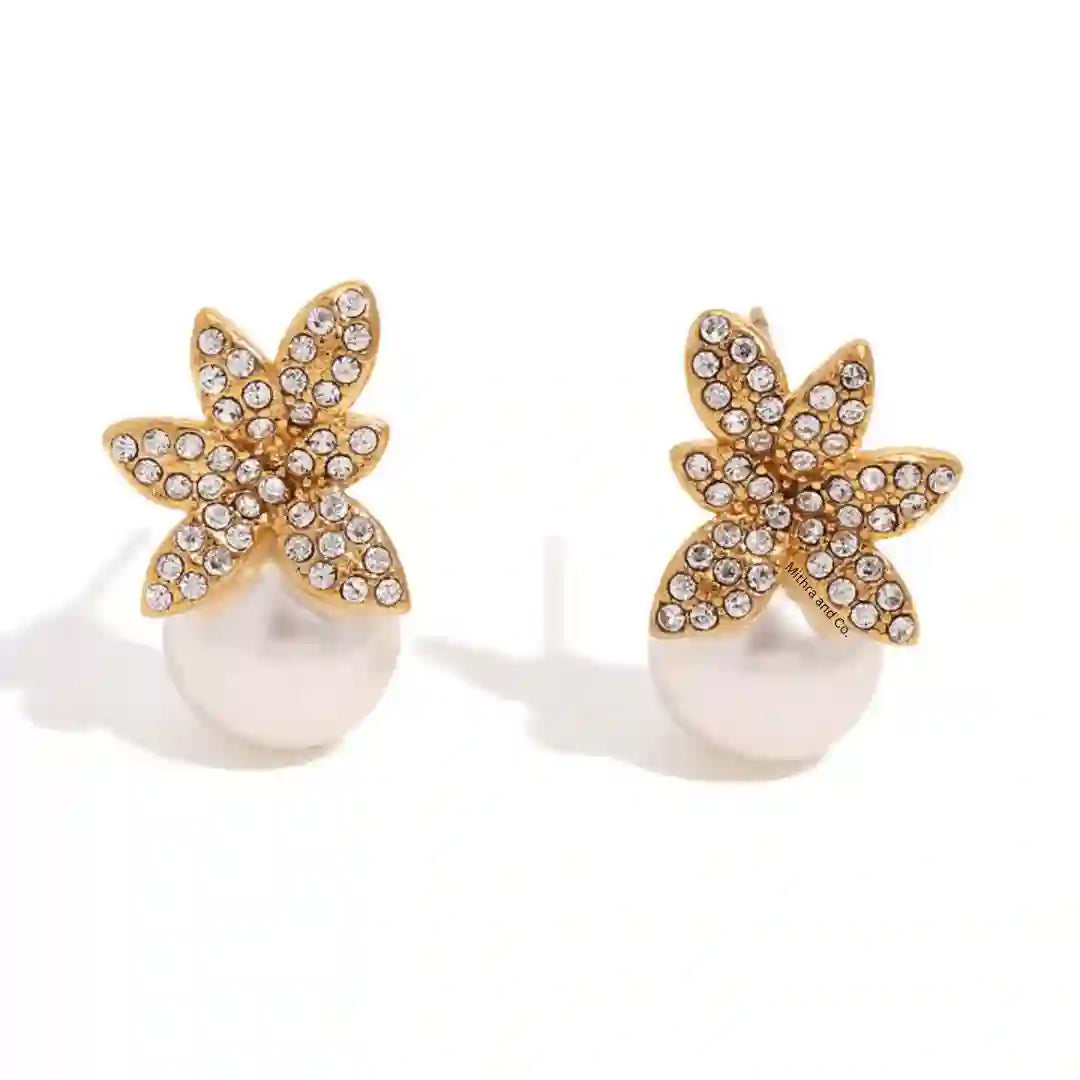 Studio shot of Pirouette Studs. 18k Gold Plated Pave Crystal Floral Pearl Drop Earrings. Shop Online at Mithra and Co.