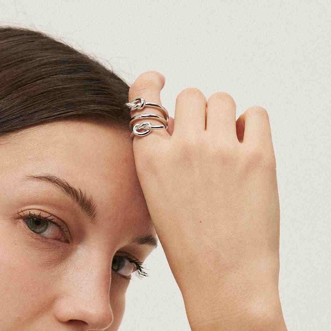 Girl Wearing Spiral Ring. Buy Now at Mithra and Co.