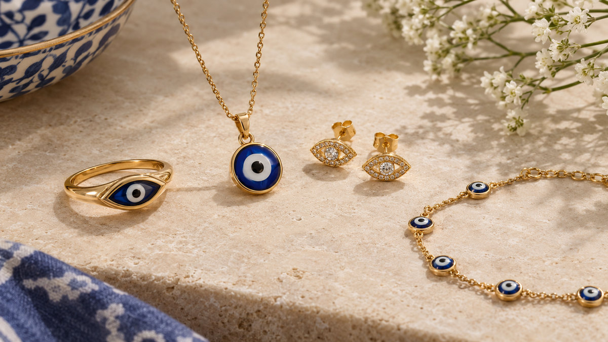 Display of Elegant Evil Eye Jewelry Flat Lay on Textured Bg.