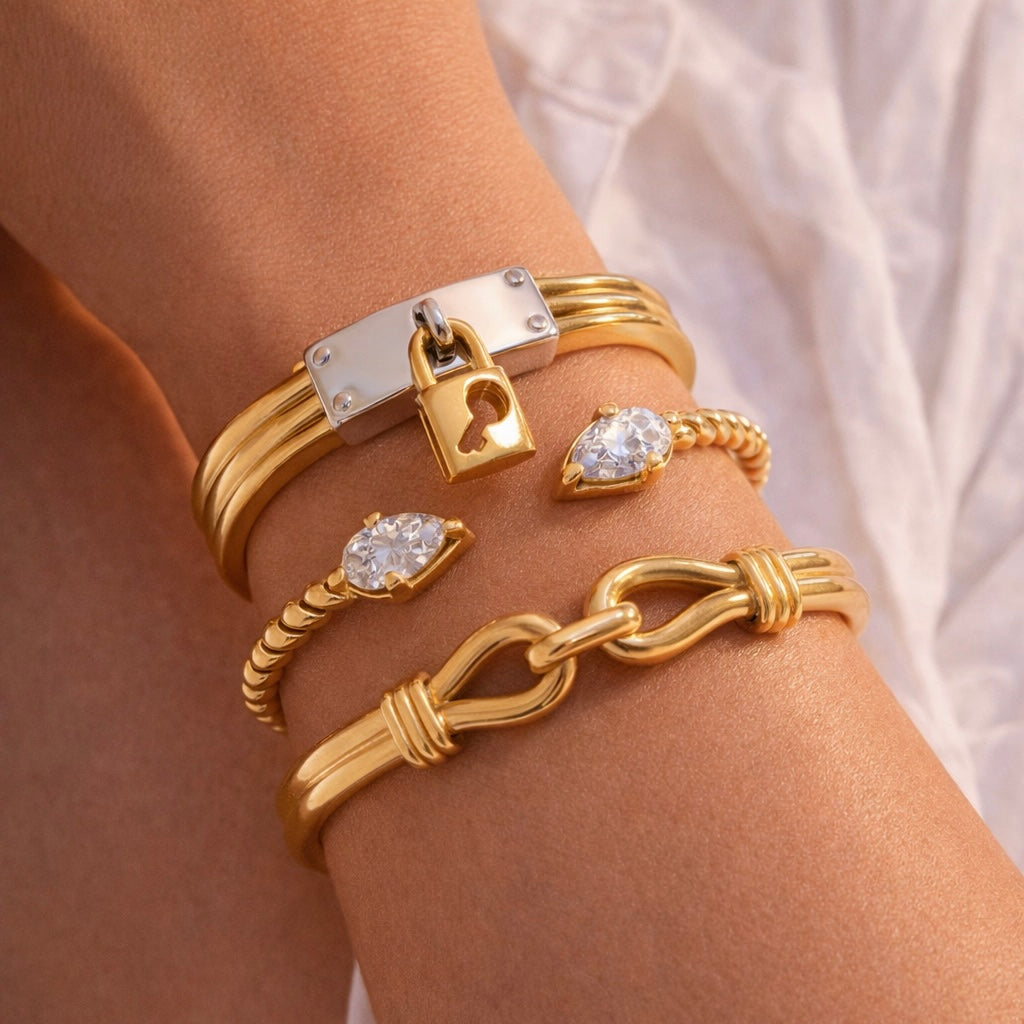 Closeup of a right hand of woman wearing Bangles from the Barely Bold Collection.