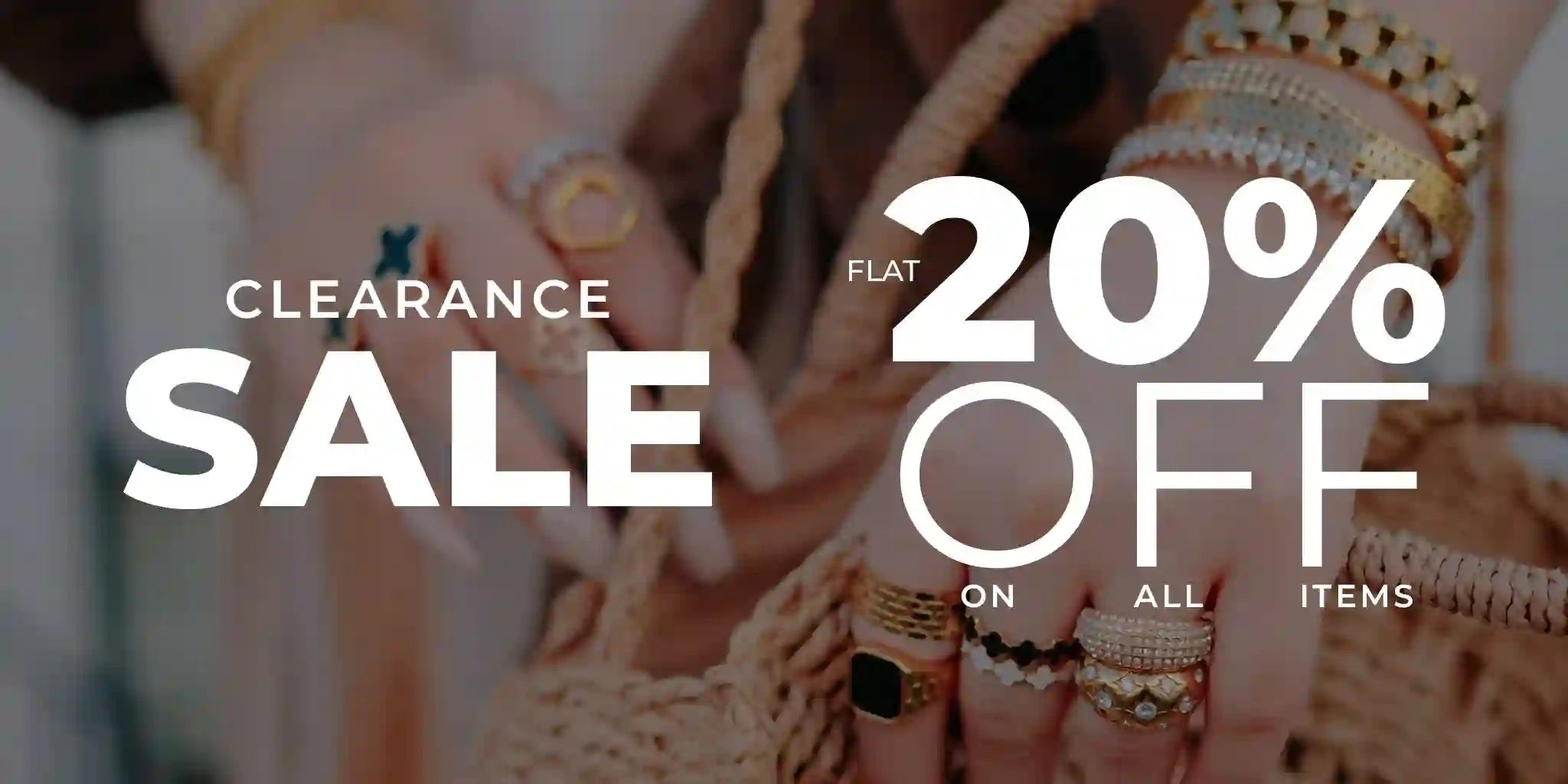 Woman wearing 18k Gold Plated rings and bracelets holding woven bag with clearance sale 20% off text