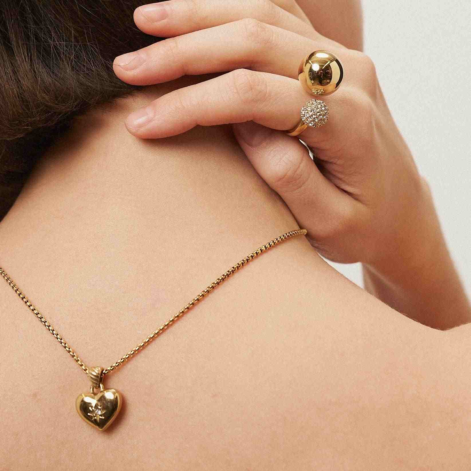 Girl wearing gold plated Ring and Necklace, Buy at Mithra and Co.