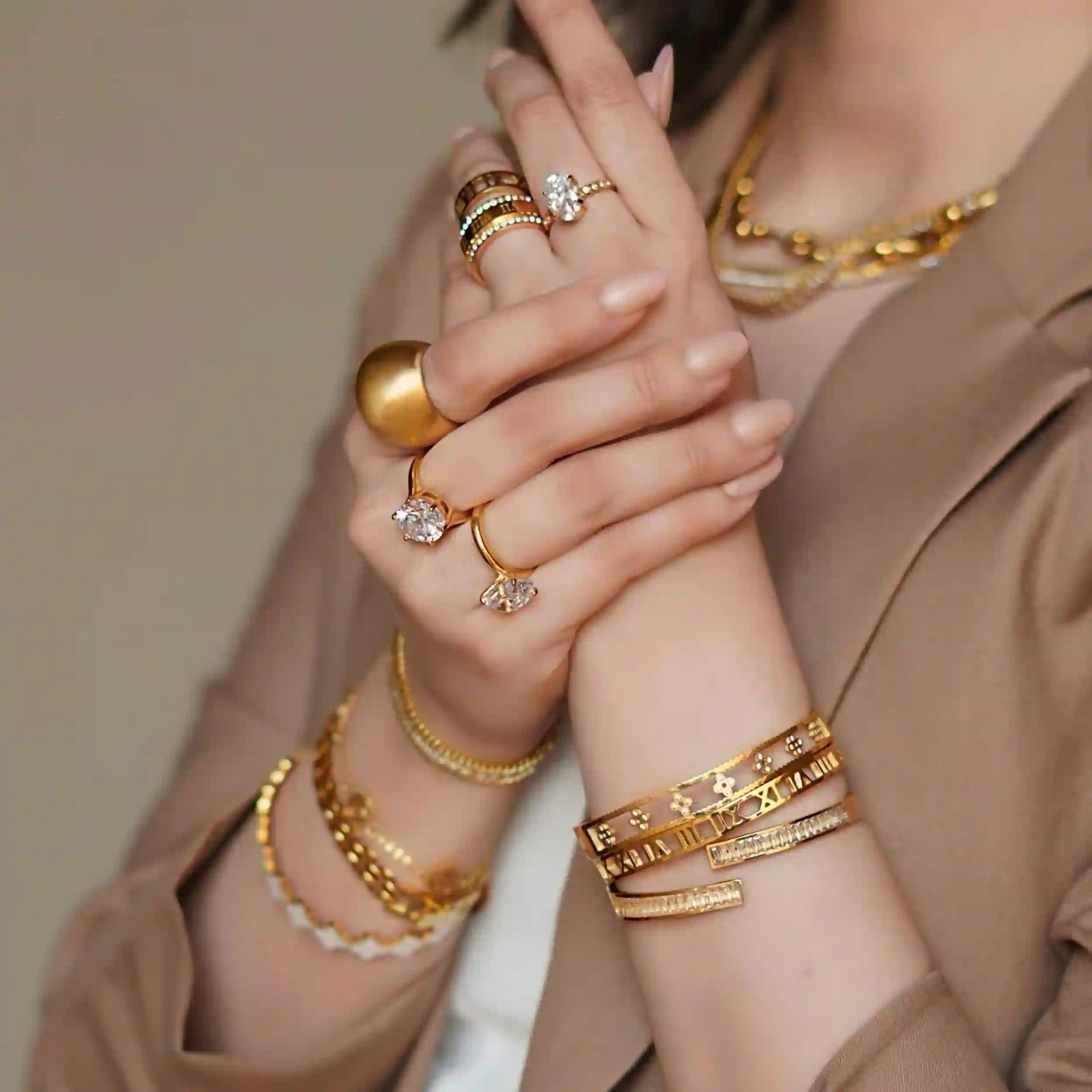 Girl wearing 18k gold plated Crown Shape ring. Shop Online at Mithra and Co.