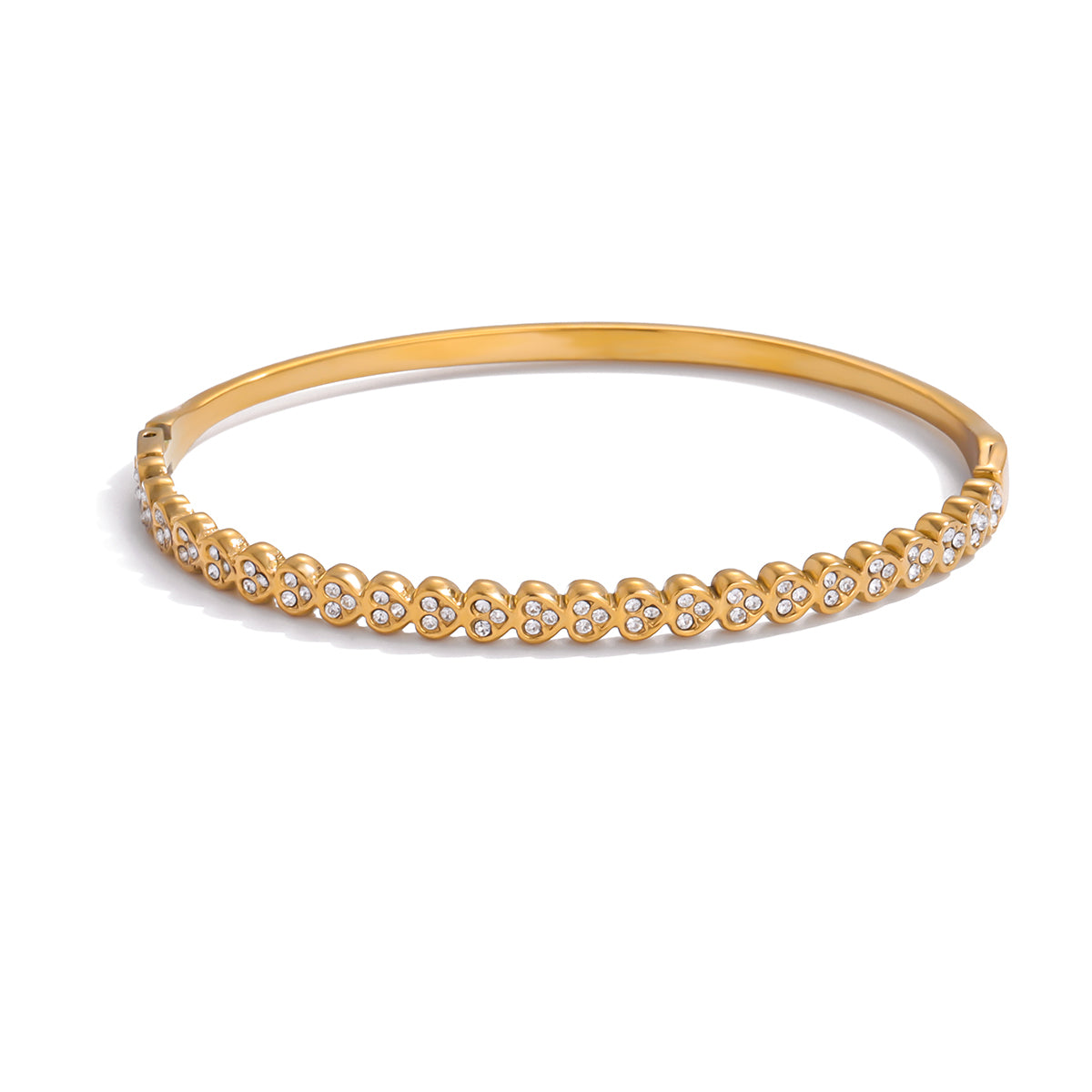 Gold bracelet with small diamonds on a white background