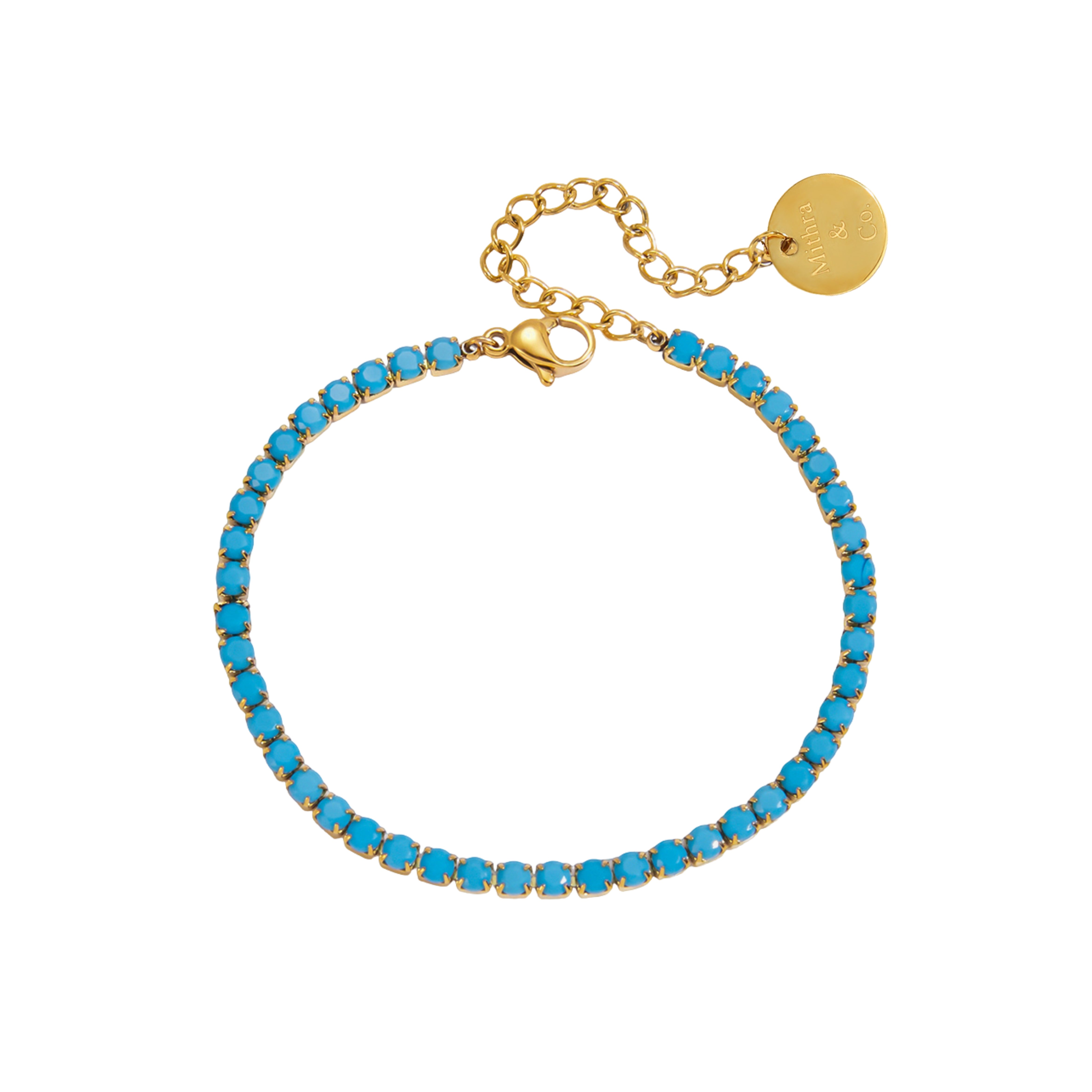 Gold bracelet with blue beads on a white background