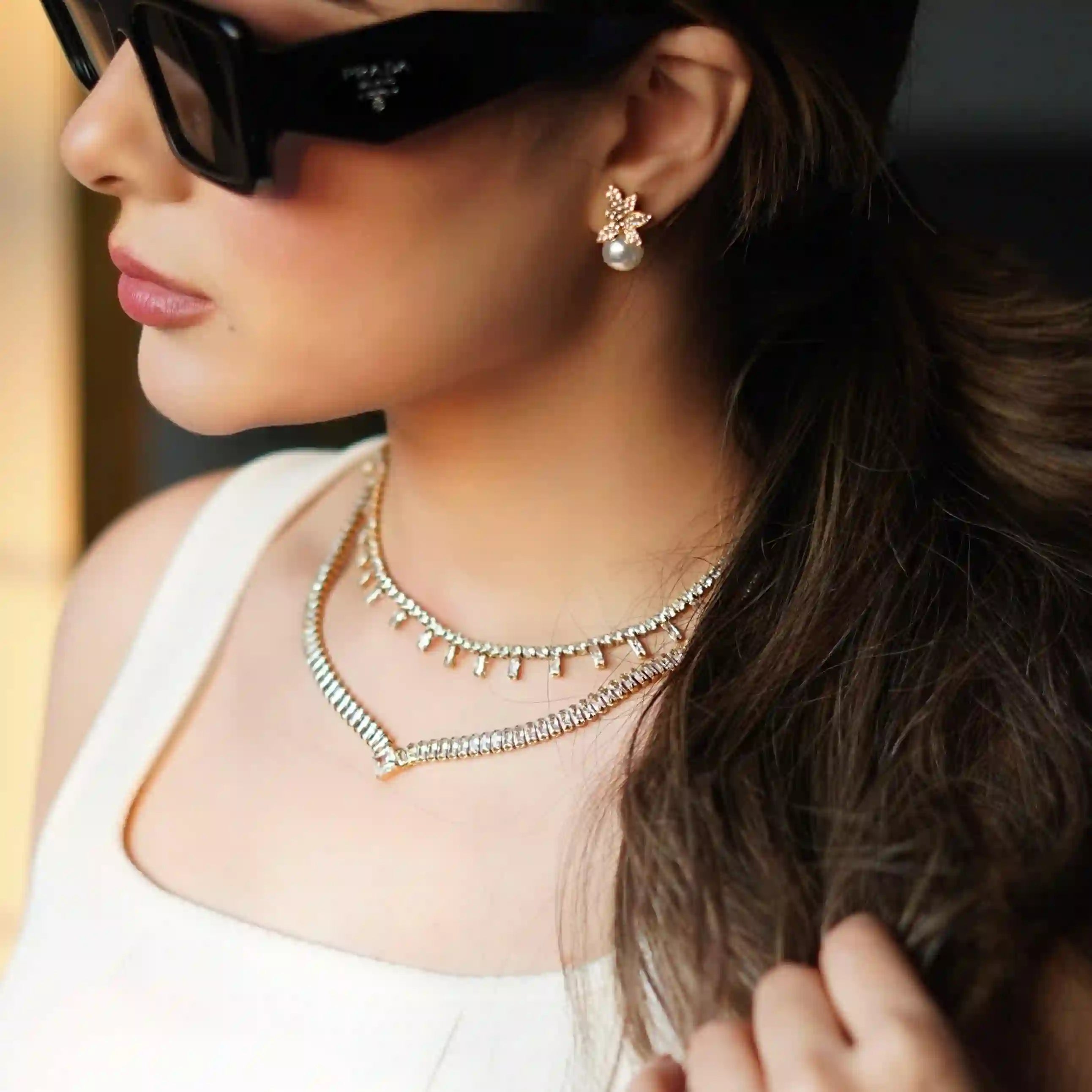 Girl Wearing V shape tennis style Legacy necklace. Buy 18k Gold Plated Online at Mithra and Co.