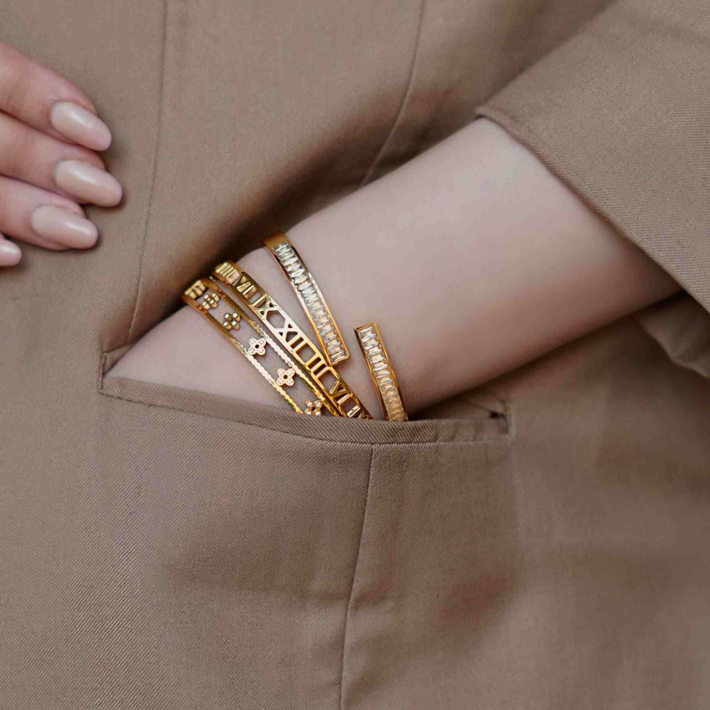 Girl wearing 18k  Gold Plated Bracelets. Shop Online in Pakistan at Mithra and Co.