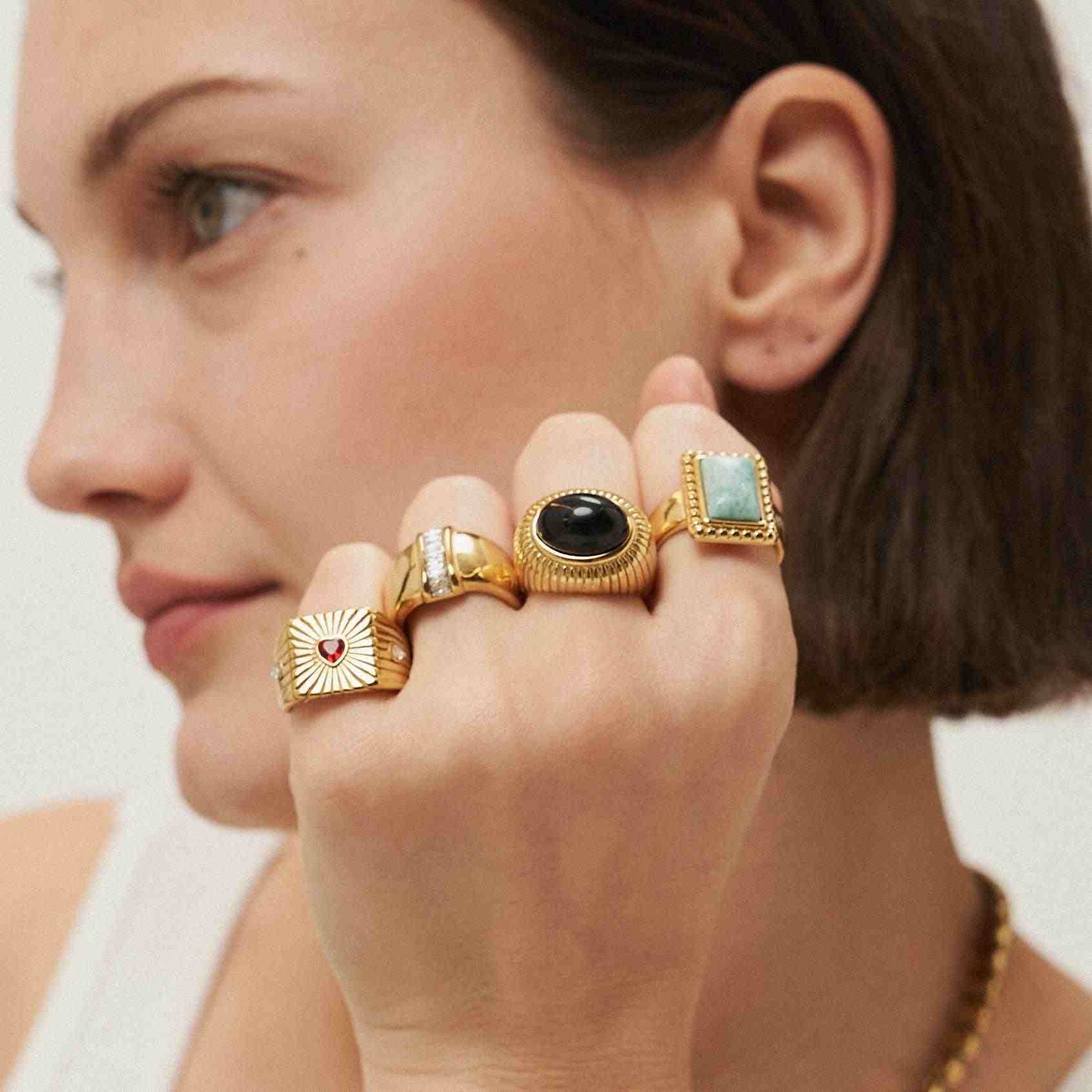 Girl wearing 18k Gold Plated Ring with Green Stone amazonite. Shop at Mithra and Co.
