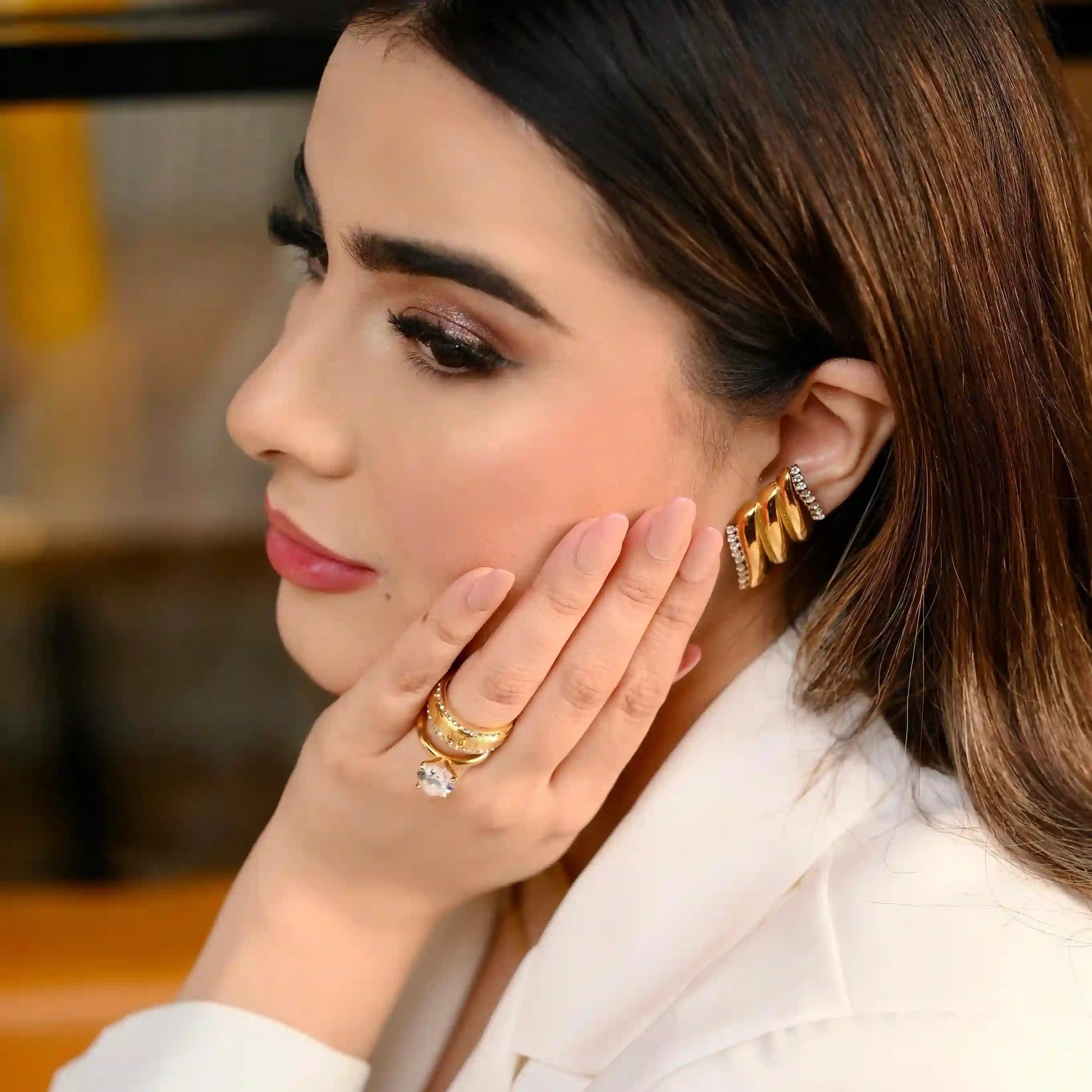 Girl Wearing 18k Gold Plated Band. Shop at Mithra and Co.
