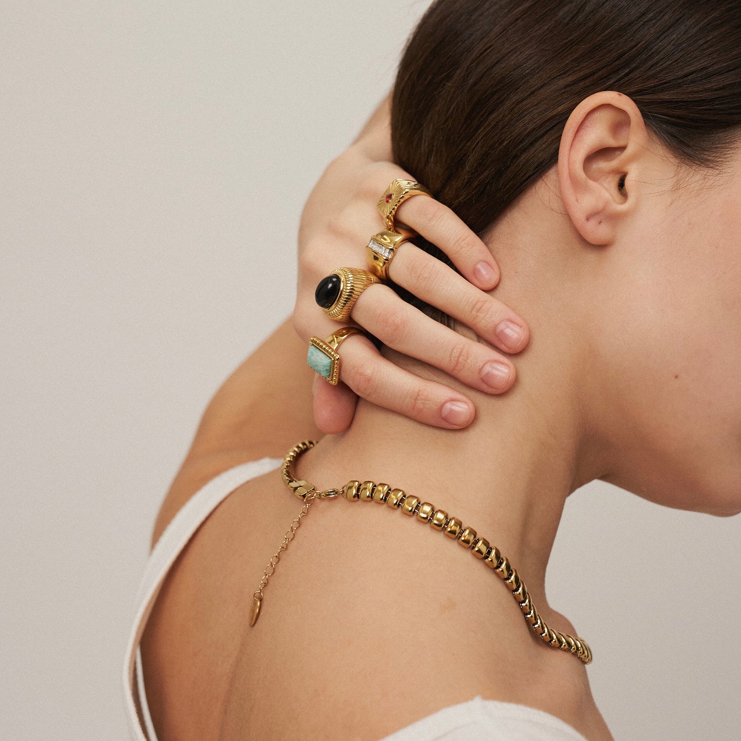Girl wearing Mithra and Co's Gold Plated Jewelry Made of Waterproof Stainless steel.