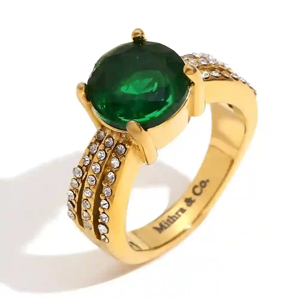 Studio shot of Aurora Emerald Gemstone Ring with 3 rows of studded micro zircons.