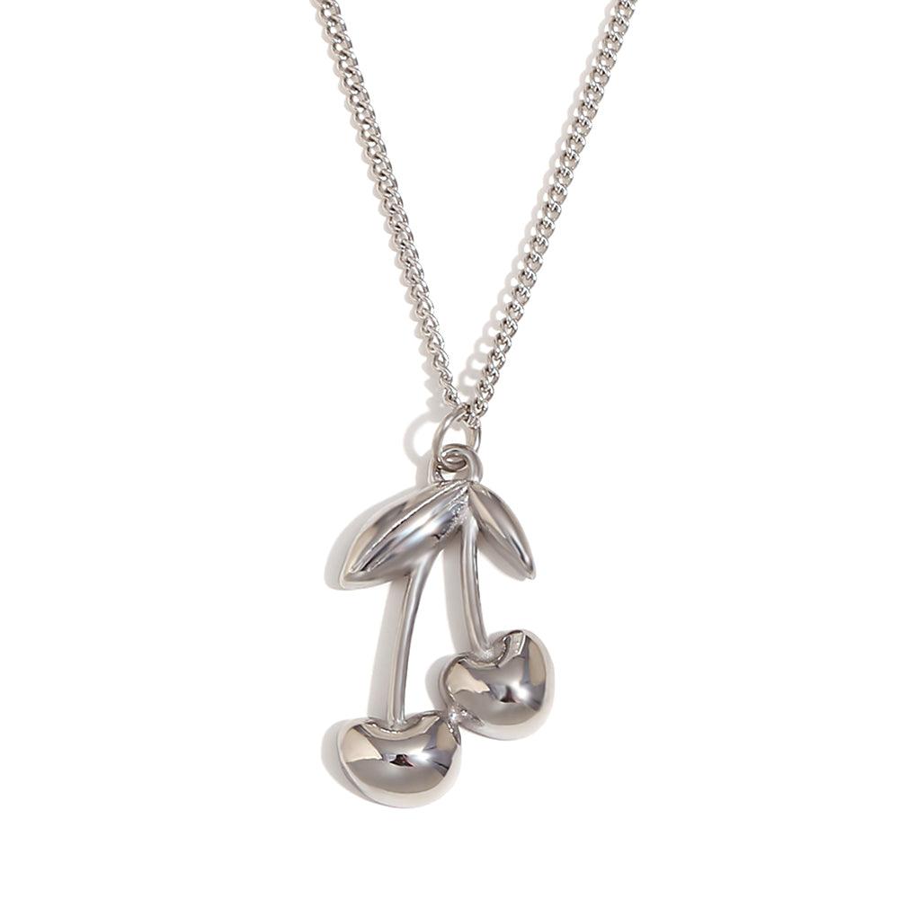 Studio shot of Cherry Pendant Fine Chain Necklace - 925 silver Plated. Buy at Mithra and Co.