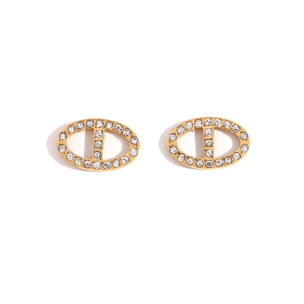 Studio shot of Dreams Studs - Shop 18k Gold Plated Pavé-Bordered Oval Link Earrings Online at Mithra and Co.