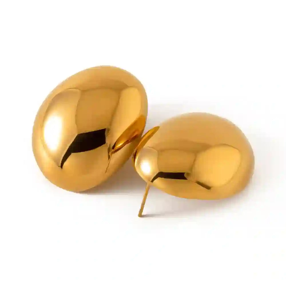 Studio shot of Dome Gold Earrings - Golden Rivulet featuring a Bulbous Oval Pebble Stud Architecture. Buy Online at Mithra and Co.