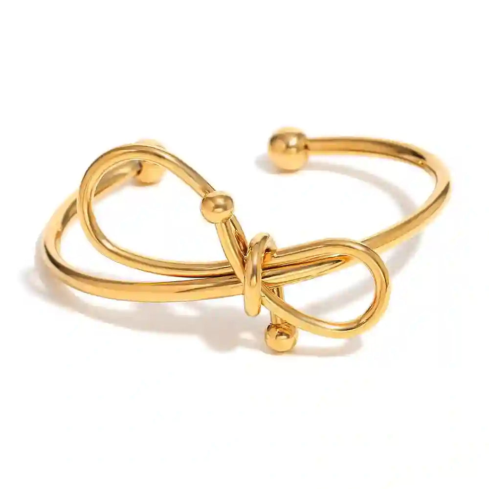 Shop 18k Gold plated Love Knot Cuff Bracelet at Mithra and Co.