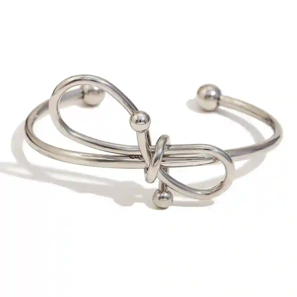Shop Silver plated Elegant Love Knot so simple Cuff Bracelet at Mithra and Co.