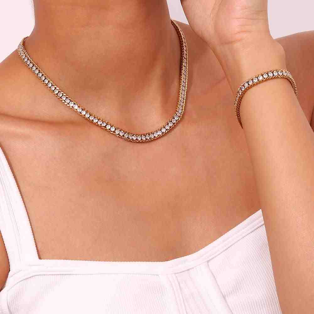 Girl wearing 18k Gold Plated Luster Choker Necklace and Luster Bracelet. Featuring Parallel Rope chain and Pavé Zircon Track Architecture.