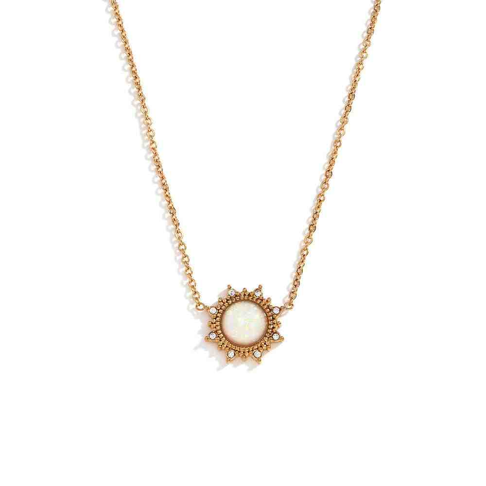 Studio shot of Simple and Elegant Sun Opal Necklace. 18k Gold Plated Petite Opal Pendant with a Sun-Inspired Halo.