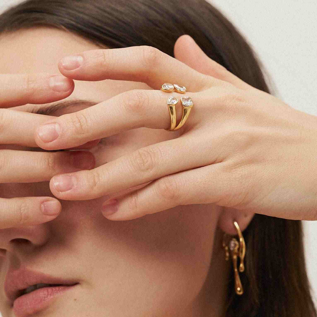 GIrl Wearing 18 Gold Plated 4 Stone Mixed Cut Tetra Ring. Buy at Mithra and Co.