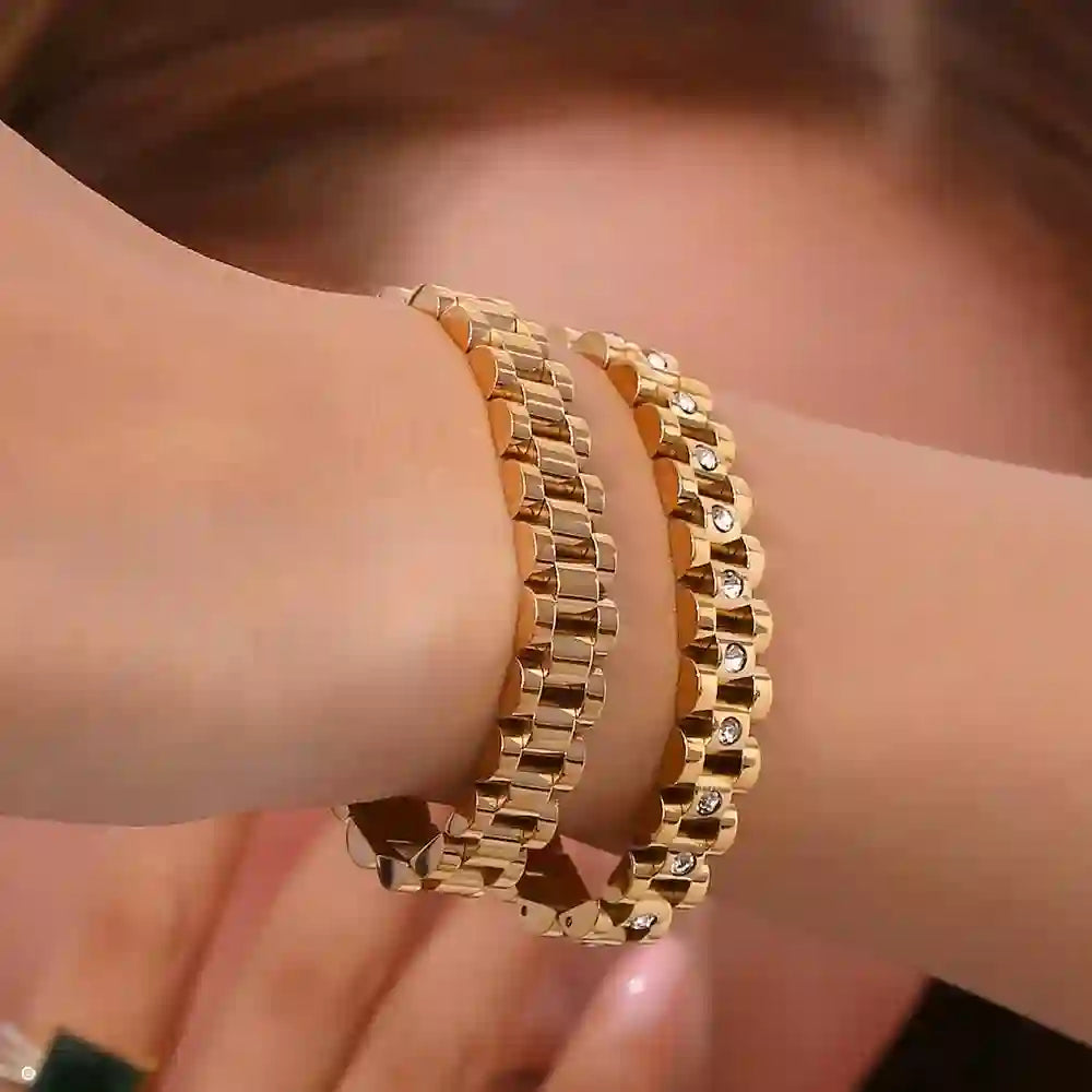 Closeup of a Girl hand hiding the face wearing michael bold bracelet and zircon studded michael bold bracelets.
