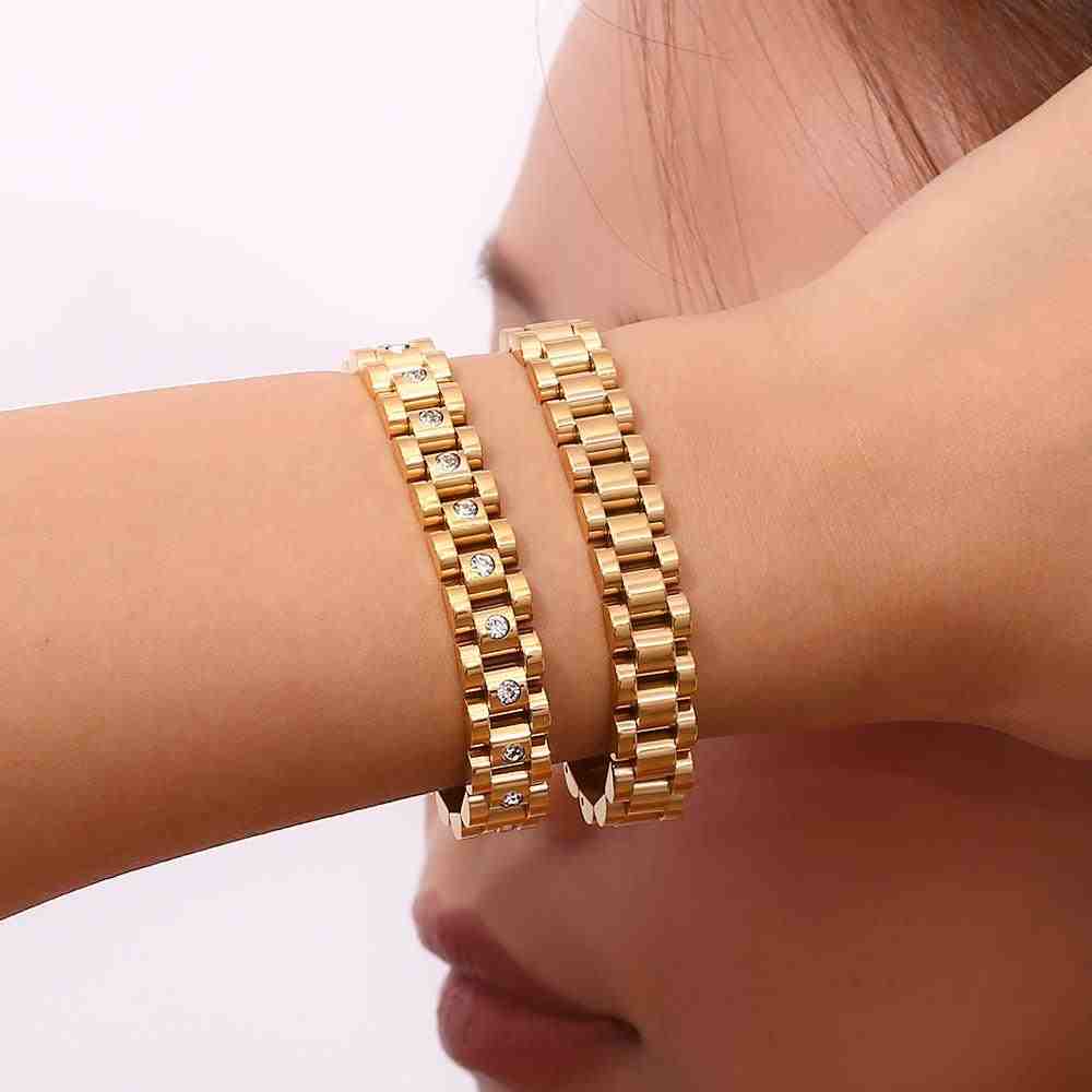 Closeup of a Woman's hand Wearing Both Micro ZIrcon Studded Michael Bold and Michael Bold Bracelets.