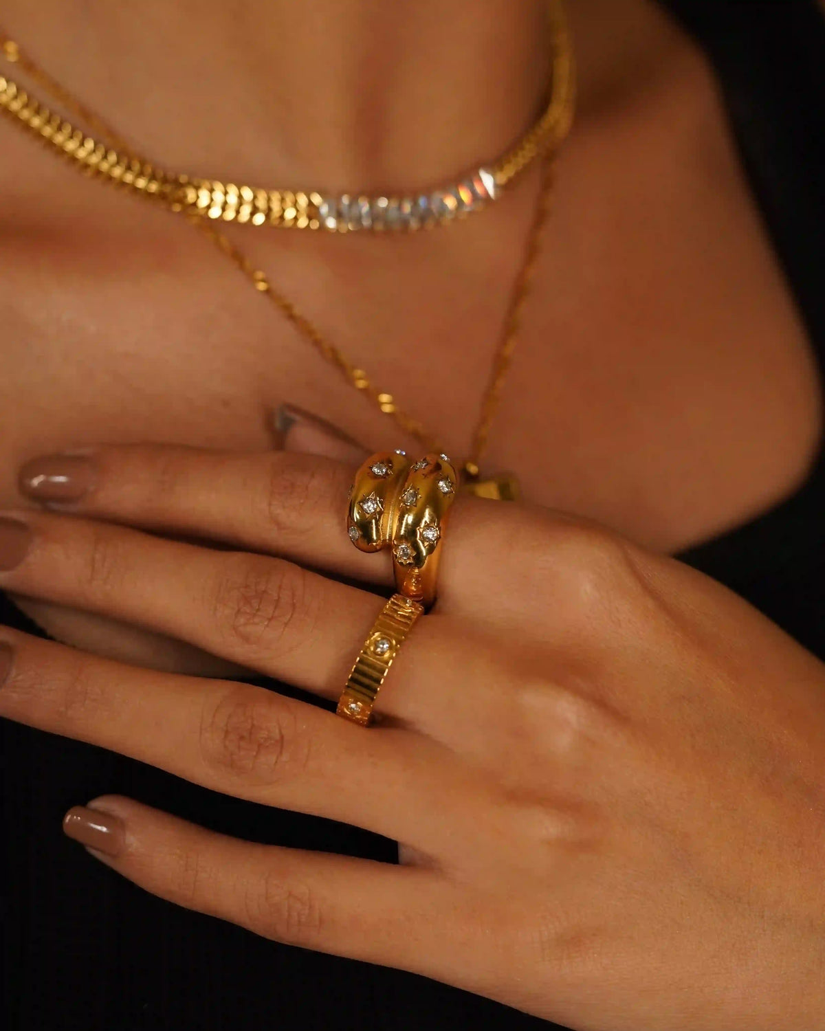 Girl wearing Waterproof 18k Gold plated Coil Studded Ring celestial with ring and gold plated neckchains.