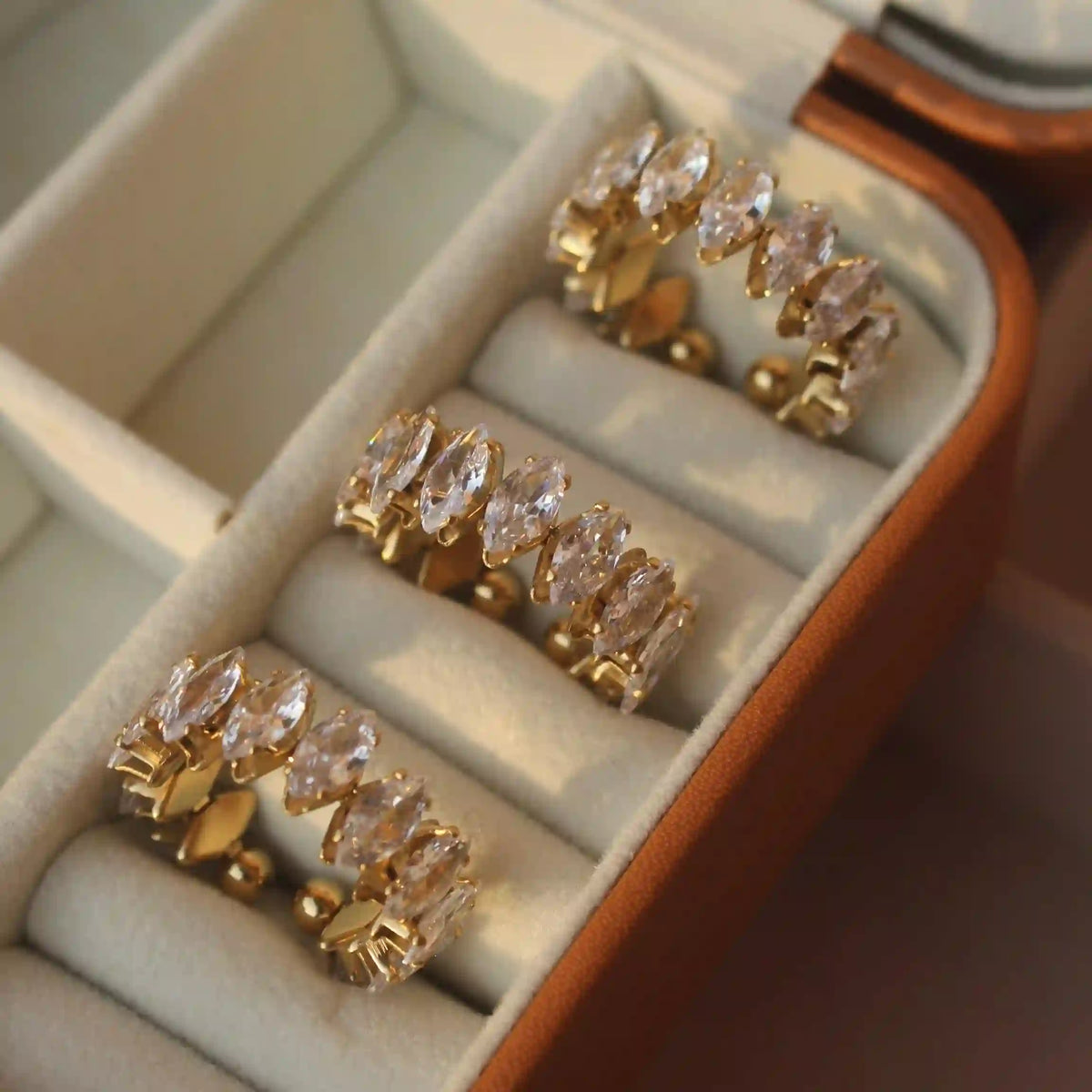 Jewelry box containing 3 fifi rings 18k Gold plated Adjustable open cut band ring with marquise set zircons Shop Online - Mithra and Co.