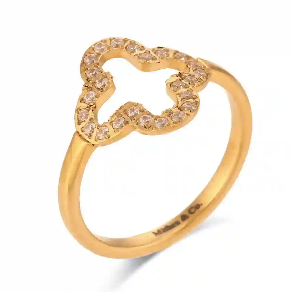Studio shot of 18k Gold plated Hollow Clover suddedr ing with 4 leaf clover floral design bordered with embedded zircons.