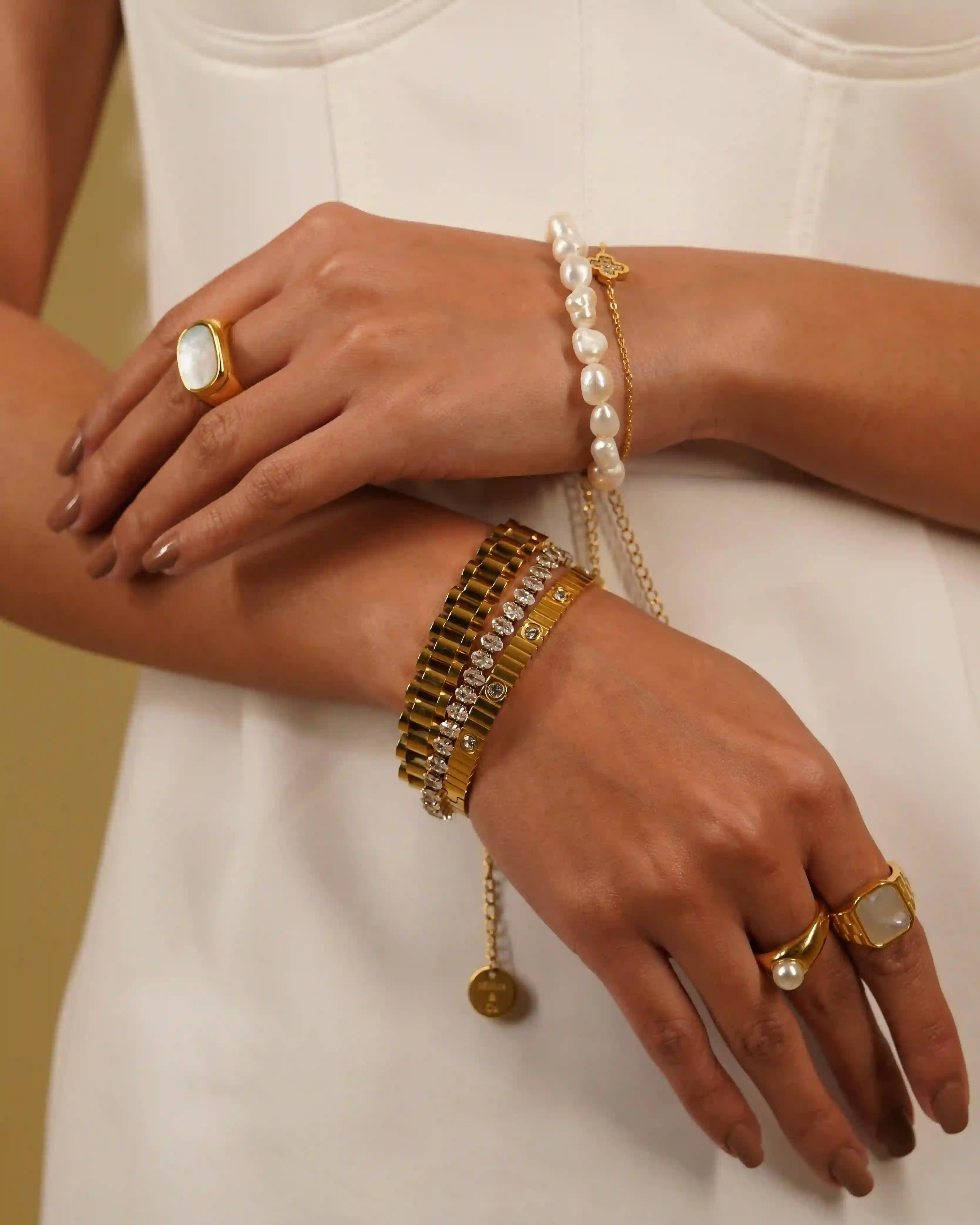Buy Waterproof 18k Gold plated Coil Studded Bangle at Mithra and Co.